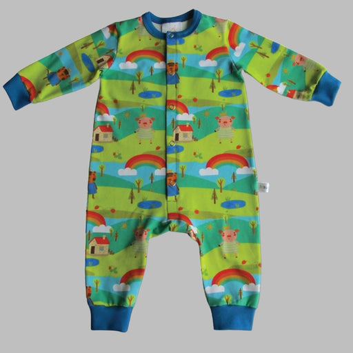 long sleeved baby romper with blue cuffs and neck banc and pattern of green hills, blue skys and rainbpws