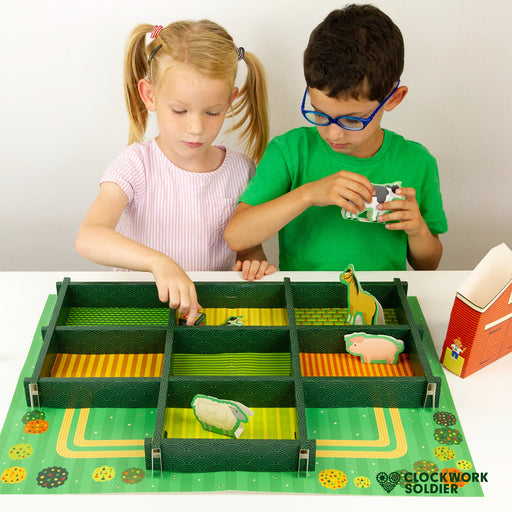 two kids playing the fantastic farmyard game, fulls of greens and white background