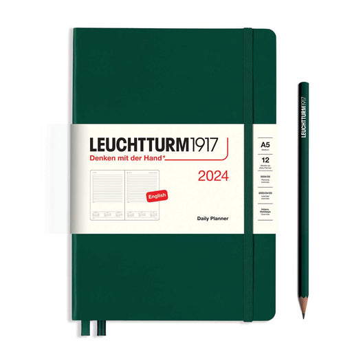 green 2024 Leuchtturm1917 daily planner with elastic green band and two green page markers and green pencil to right