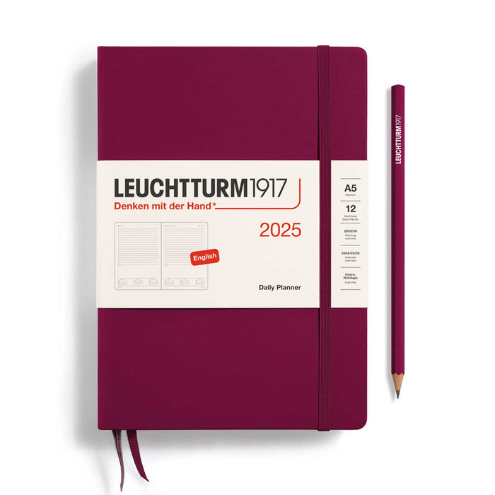 2025 daily diary, port red with white paper title banner,  port red elastic and two port red ribbons