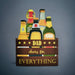 Decorative sign with beer bottles and 'Dad, cheers for everything' text on a gray background