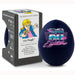 dark blue egg shaped egg timer with 80's on front beside  a black product box with white label