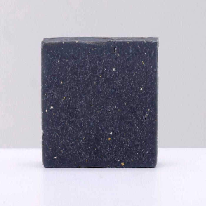 Black soap bar on a white background