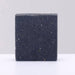 Black soap bar on a white background