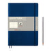 b5 navy softcover notebook with blue elastic band closer, two ribbon page markers and silver pencils to right