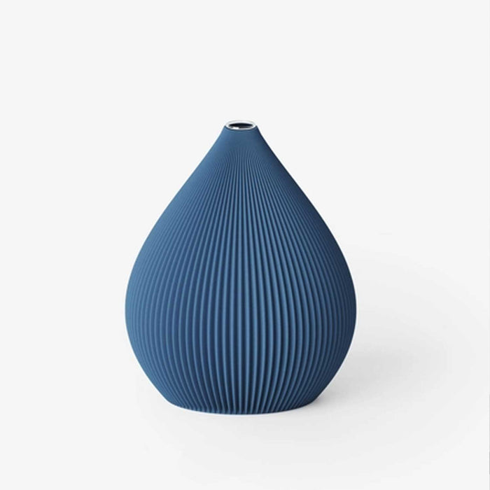 blue ridged teardrop shaped vase
