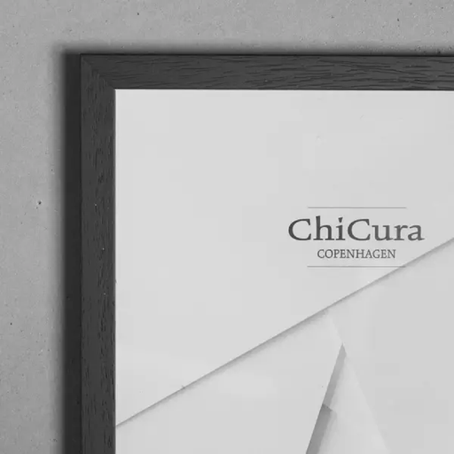 Framed artwork with 'ChiCura Copenhagen' text on a gray background