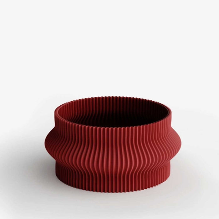 red ridged bowl with extruded ring around middle