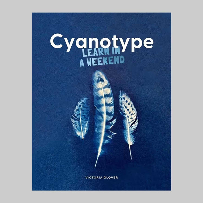 Cyanotype Learn in a Weekend blue book with 3 white and blue feathers on the cover