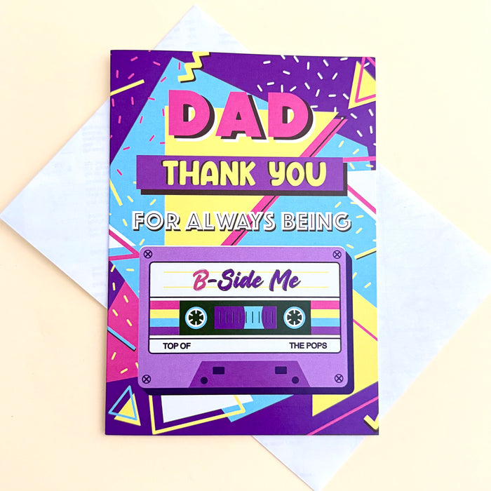purple, pink, yellow and blue 80s style father's day greeting card with a cassette tape on the cover