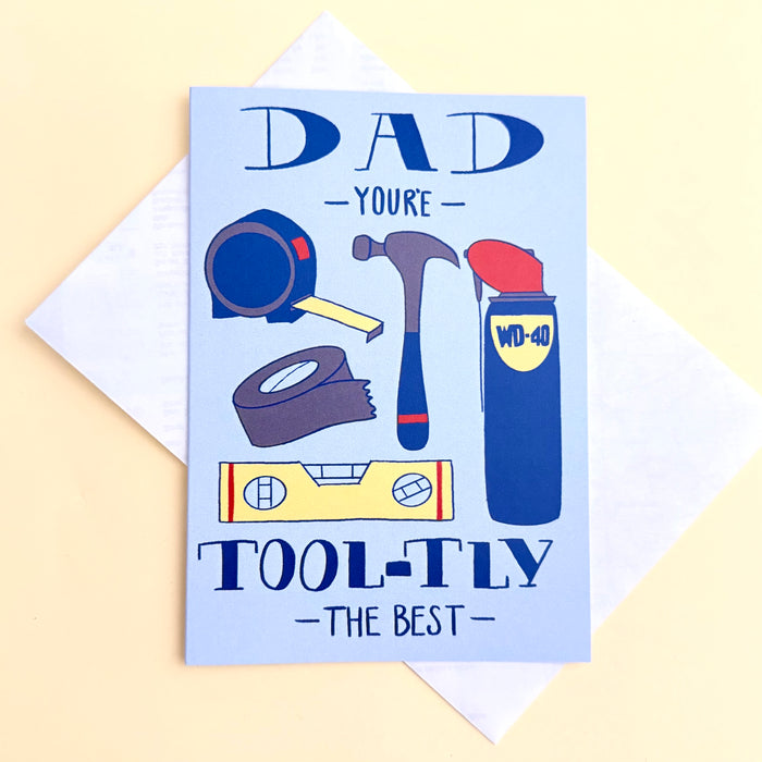 Dad Youre Tool-tly the Best fathers day card with pun spelling of totally and drawings of various tools like a hammer, measuring tape, tape, spirit level and can of WD-40
