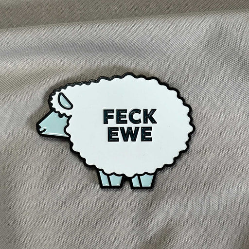 white and blue sheep shaped magnet with Feck Ewe in black lettering in centre