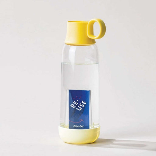 clear water bottle with yellow base and cap that has a  round yellow holder attached. A blue re-use cardboard tag can be seen in centre of bottle