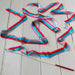 Colorful ribbon with a stick on a light wooden surface