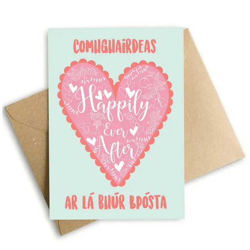 blue greeting card with pink loveheart and white scriptive text with ahppily ever after in centre of heart