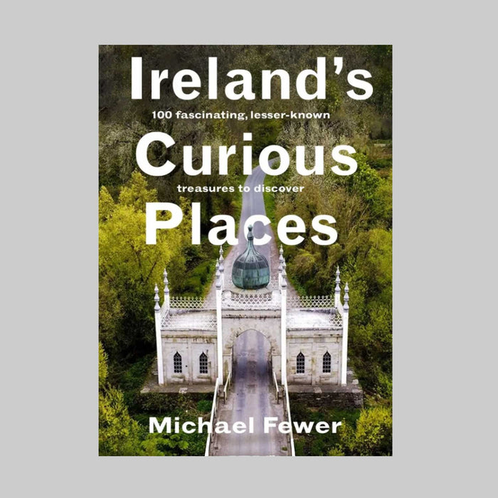 Ireland's Curious Places book cover showing a grand and old roof covered toll bridge on a road though a forest