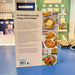 Book cover with text and images of food on a table
