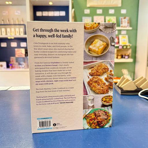 Book cover with text and images of food on a table