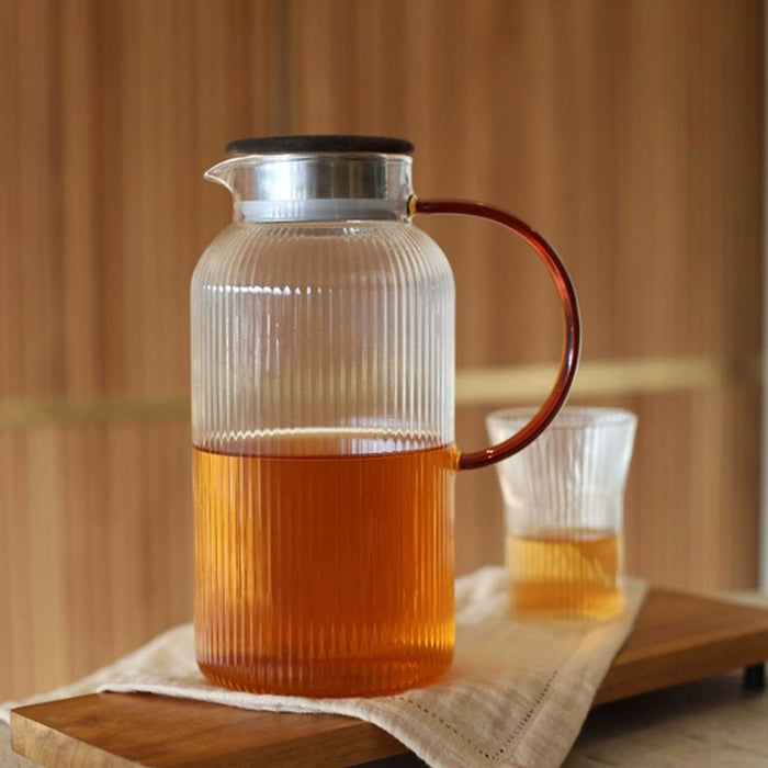 Karl Glass Pitcher. Ridged glass jug with metal lid and amber glass handle. 