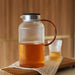 Karl Glass Pitcher. Ridged glass jug with metal lid and amber glass handle. 