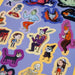 Colorful Halloween-themed stickers on a purple background