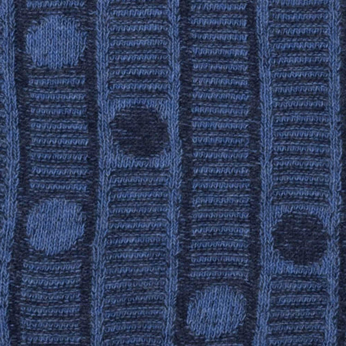 Close-up of blue textured fabric with patterns