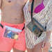 man in pink swimming trunks and woman in fuschia bikini and white top each wearing a Waterproof Waist Bag, one is white and one is black, both have black straps