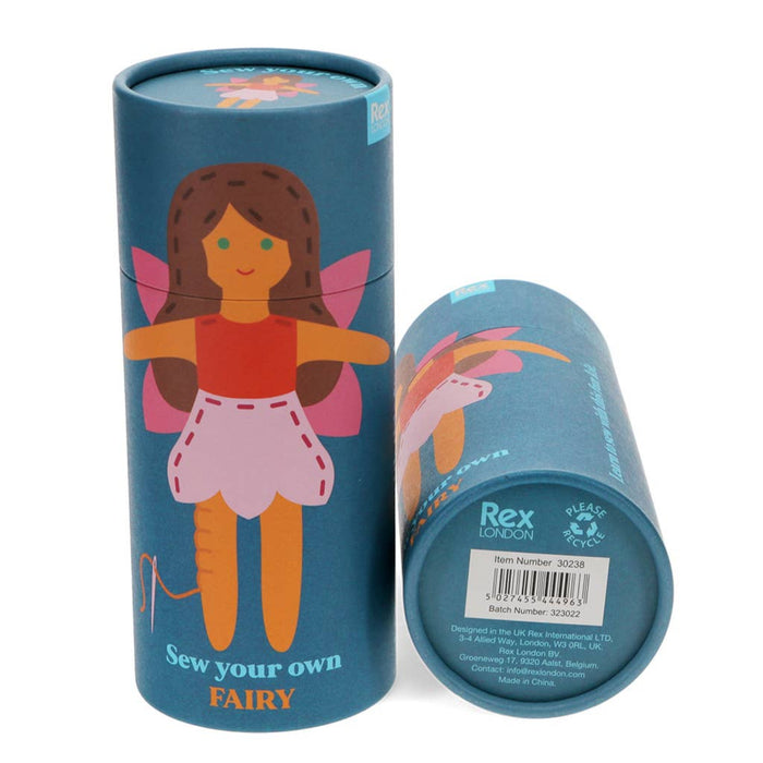 Cylindrical packaging with a fairy design and 'Rex London' branding on a white background