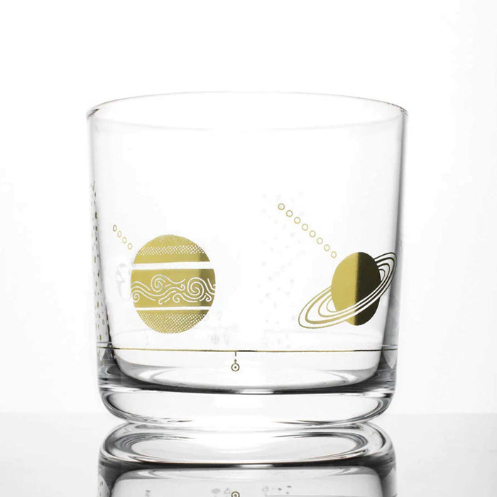 tumbler whiskey glasses with gold foil design of planets on outside of glass