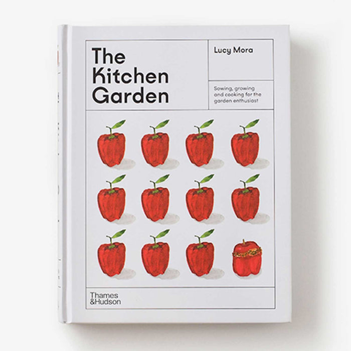 the kitchen garden book with white cover and 12 red peppers on front