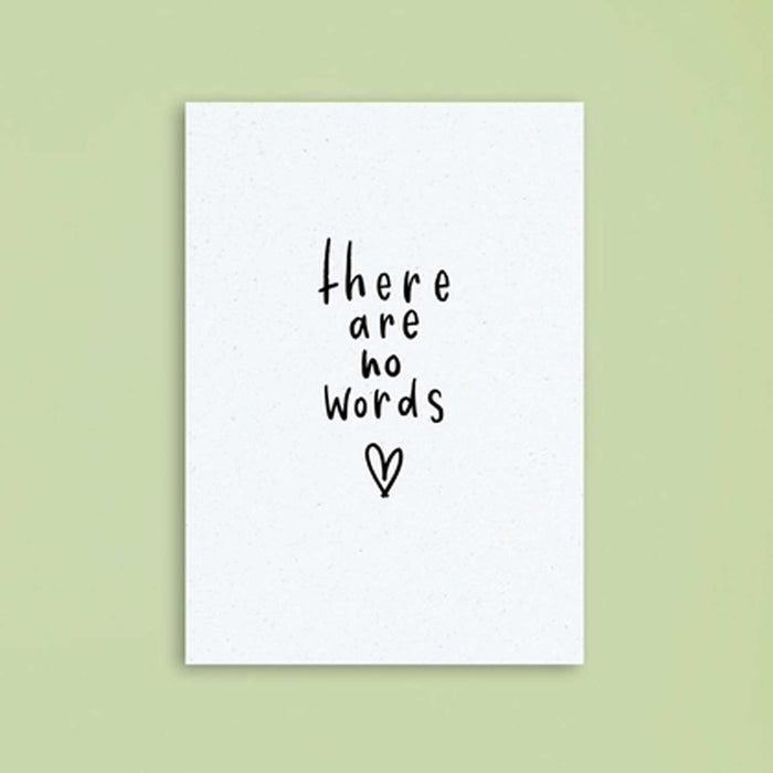 Sympathy card with black lower case text 'there are no words' and simple loveheart