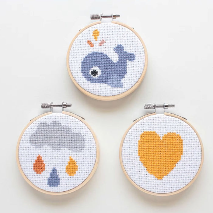 Wally the Whale Cross Stitch Kit featuring a cute blue whale design with embroidery thread and cotton fabric for ocean-themed crafting