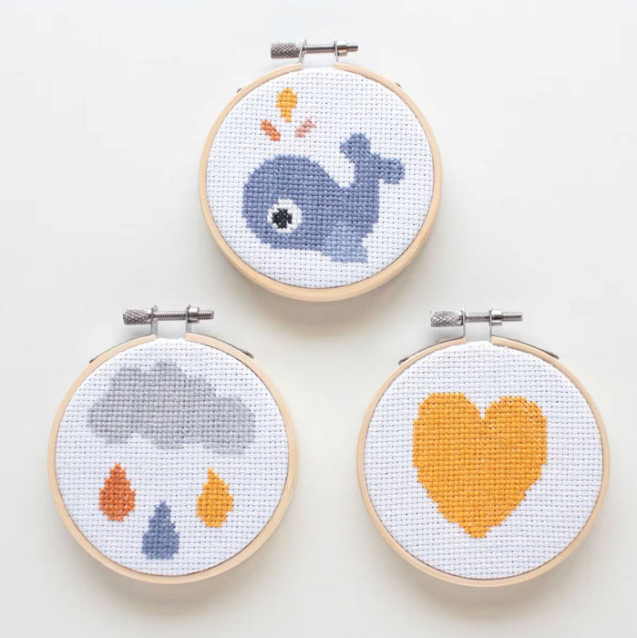 Wally the Whale Cross Stitch Kit featuring a cute blue whale design with embroidery thread and cotton fabric for ocean-themed crafting