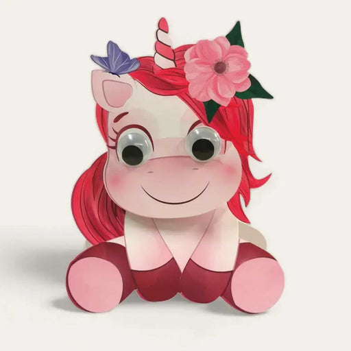 PINK CUT OUT UNICORN WOBBLY HEAD CARD WITH PINK HAIR, AND PURLPE BUTTERLFLY AND PINK FLOWER IN HAIR