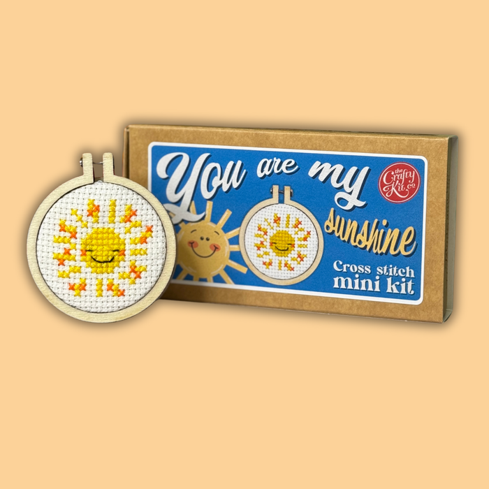 Cross stitch mini kit with 'You are my sunshine' design on a beige background