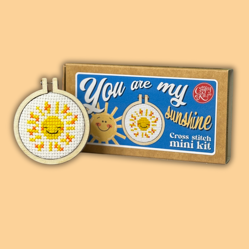 Cross stitch mini kit with 'You are my sunshine' design on a beige background