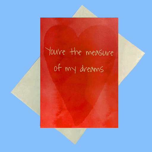 red card with heart and white text on the front, on top of a white envelope with blue background