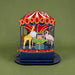Toy carousel with animals on a green background