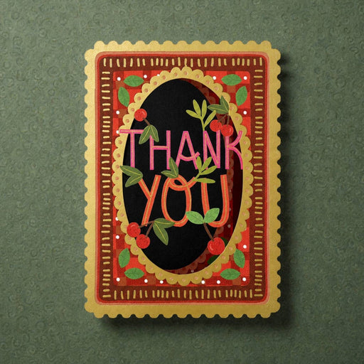 Decorative card with 'THANK YOU' text on a green background