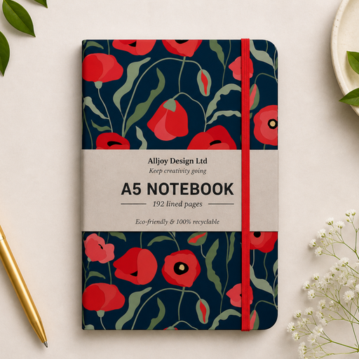 A floral A5 notebook with a navy blue background, red poppy pattern, and a cream paper band label reading 'Alleyjoy Design Ltd A5 NOTEBOOK'. The notebook is styled in a flat-lay on a light beige surface with a gold pen, white baby's breath flowers, and green leaves.