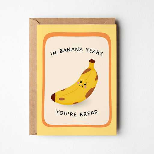 Greeting card with a banana illustration and text on a white background