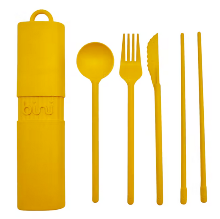 Yellow travel cutlery set with case on a white background