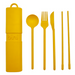 Yellow travel cutlery set with case on a white background
