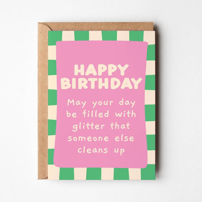 Birthday card with pink text on a green and white checkered border