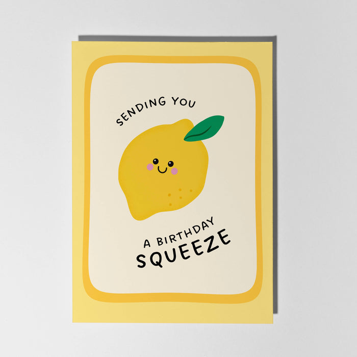 Greeting card with a lemon illustration and text on a gray background