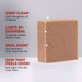Bar of soap with text highlighting features on a gray background