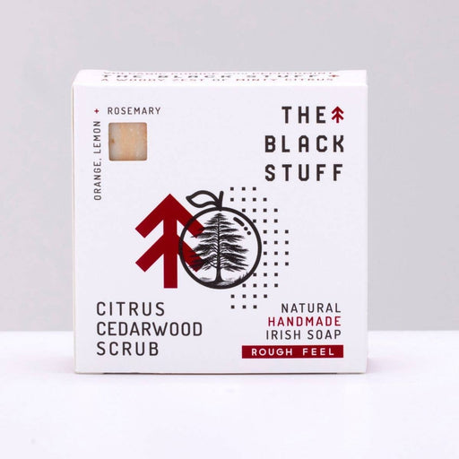 Box of 'The Black Stuff' Citrus Cedarwood Scrub soap on a white background