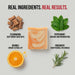 Bar of soap with ingredients like cedarwood, orange, peppermint, and rosemary on a light background.