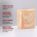 Bar of soap with text highlighting features on a gray background