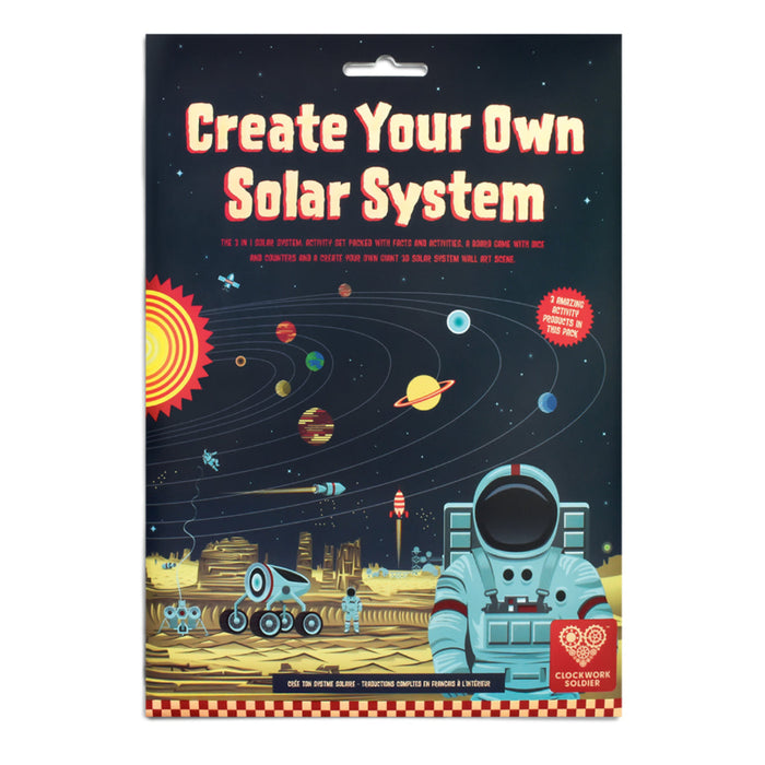 Packaged educational craft kit titled 'Create Your Own Solar System' by Rocketeer Schools, featuring a space-themed illustration with planets, an astronaut, and a solar system layout on the front.